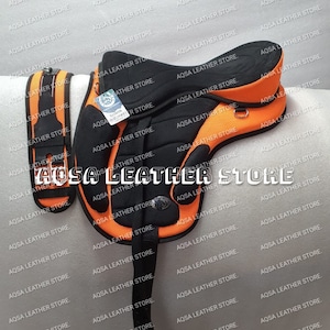 Treeless Synthetic Freemax Saddle With Stirrups And Matching Girth. Available In Various Sizes And Color Options.