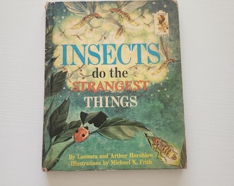 May include: A vintage book titled "Insects Do The Strangest Things." The cover features illustrations of insects, leaves, and a ladybug against a teal and green background. The book's title is in large, blue letters.