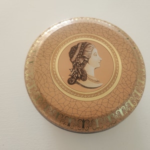 Meisler Made In Brazil Tin -- Vintage Candy Tins -- Gold and Pink Round Tin -- Advertising Candy Sweets Tin Can With Woman Graphics