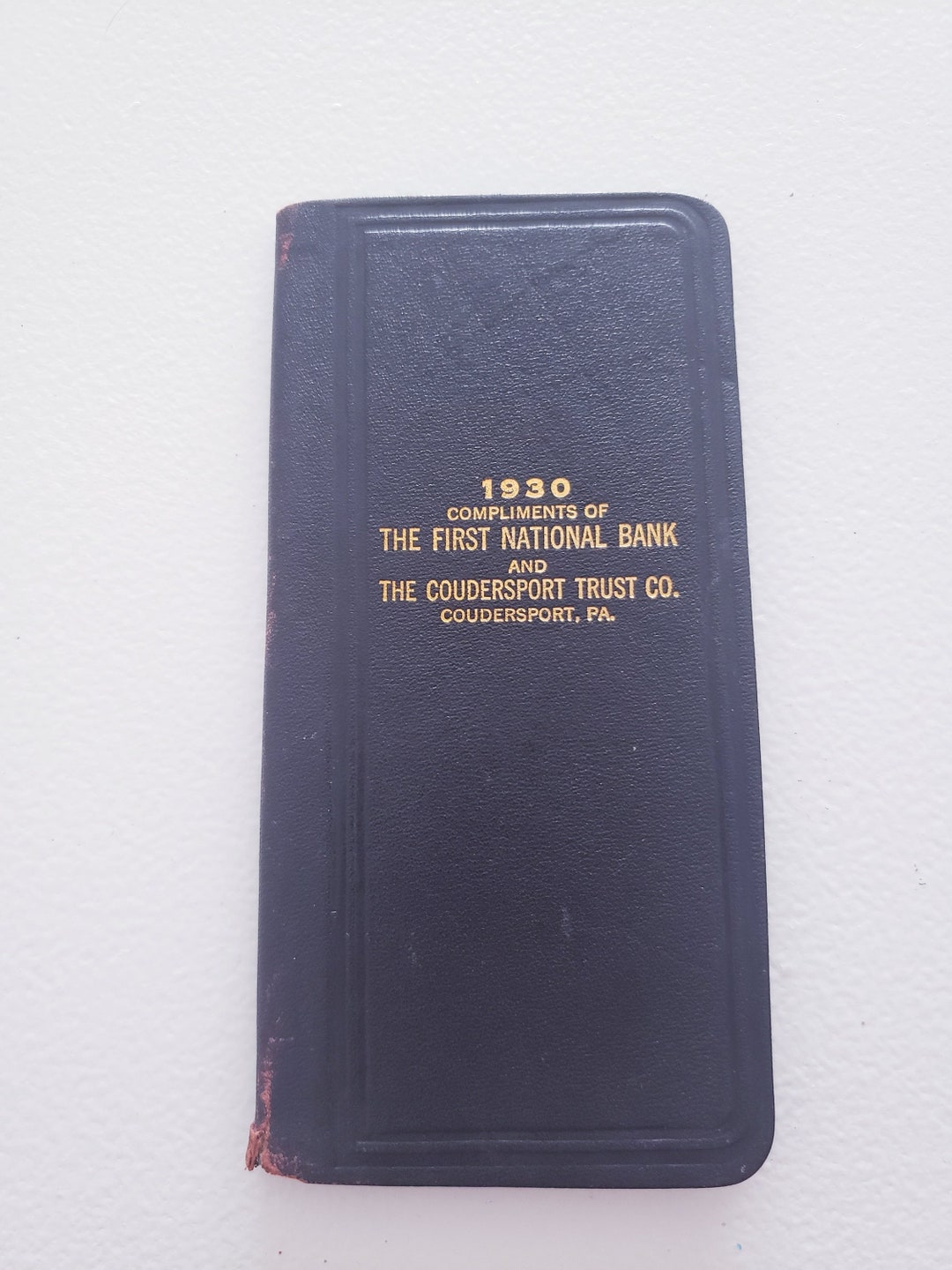 Antique pocket day planner calendar book from the first national bank