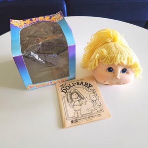 The Original Doll Baby Doll Head by Martha Nelson Thomas { 1984 } Blonde Baby Blue Eyes Spare Doll Parts  -- Doll Making Supplies Baby Dolls