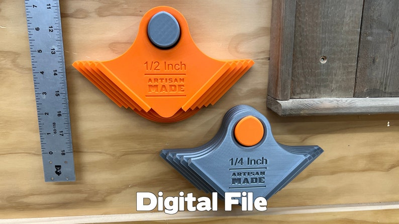 May include: Two artisan-made corner jigs, one orange and one grey, with measurements of 1/2 inch and 1/4 inch, respectively. The text "ARTISAN MADE" is visible on each jig. The image also includes a metal ruler and the text "Digital File".