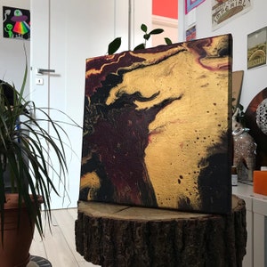 acrylic pouring painting gold and purple abstraction