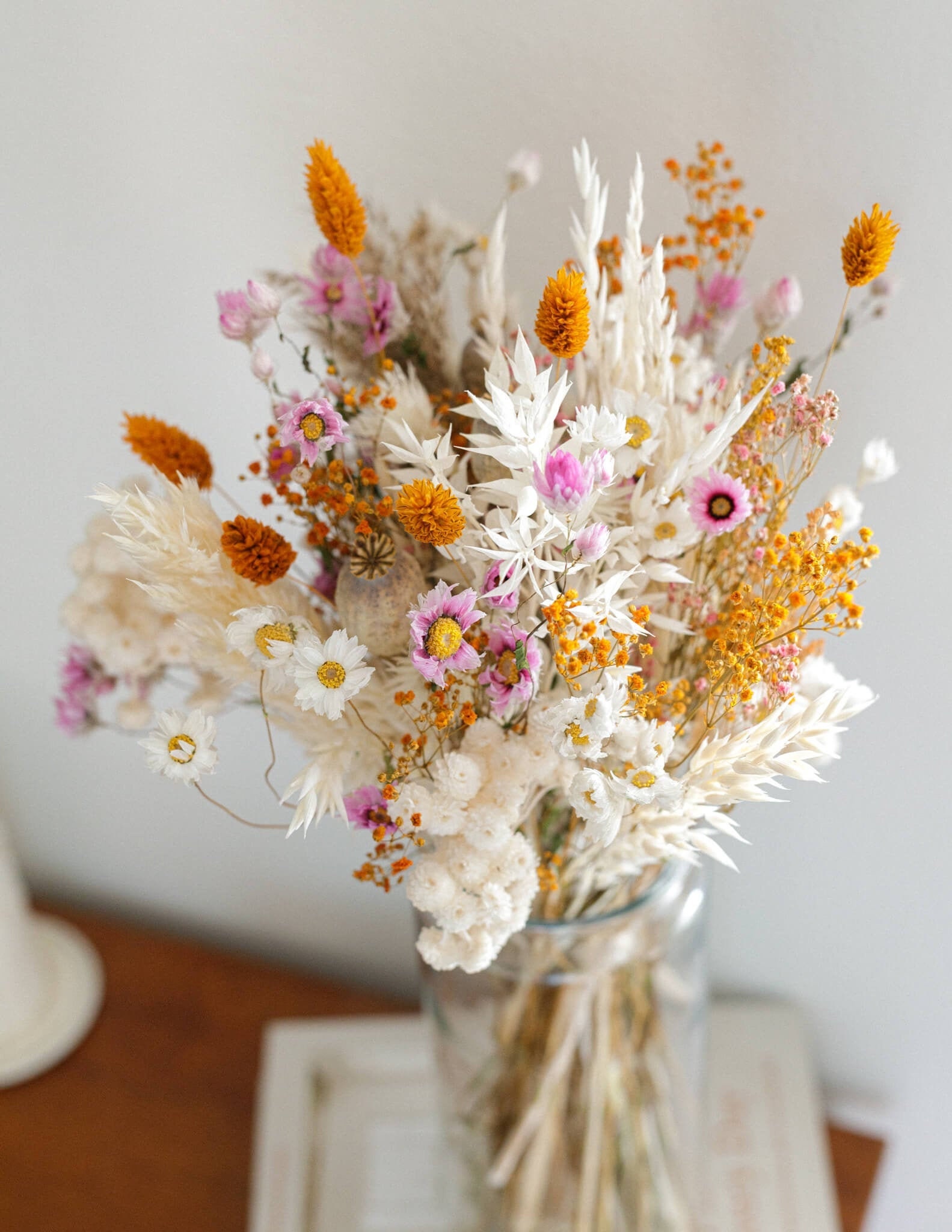 Three vases filled with natural-coloured dried flowers - MyFlowers