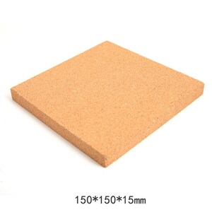 May include: A square, light brown cork board. The board is 150mm x 150mm x 15mm. The cork has a textured surface and is suitable for crafts, insulation, or as a bulletin board.