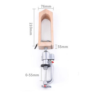 May include: A wooden clamp with a metal base and a clamp that can be adjusted from 0 to 55 mm. The clamp is 76 mm wide, 210 mm tall, and 55 mm deep.