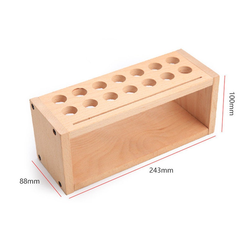 May include: Wooden organizer with 20 round holes for storing paint tubes or other small items. The organizer measures 243mm x 88mm x 100mm.