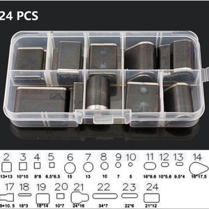 May include: A clear plastic organizer containing 24 metal leather craft tools. The tools are various shapes and sizes, including squares, circles, and ovals. The organizer has a snap closure and the text "24 PCS" is visible.