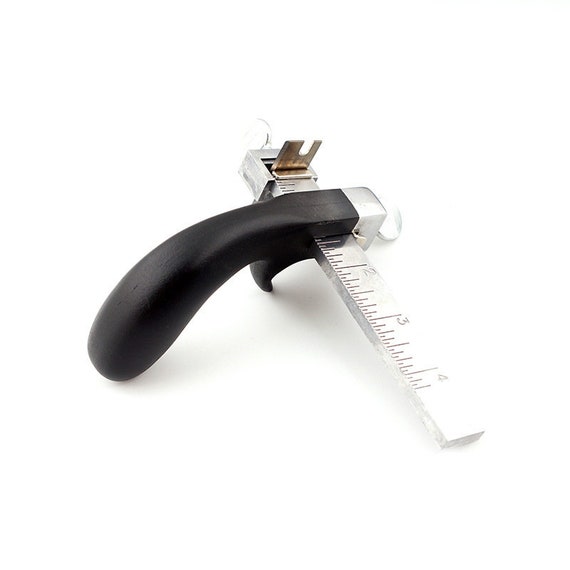 Draw gauge- leather strap cutter 