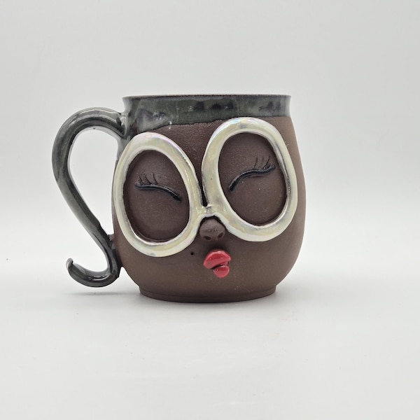 Handmade ceramic face mug