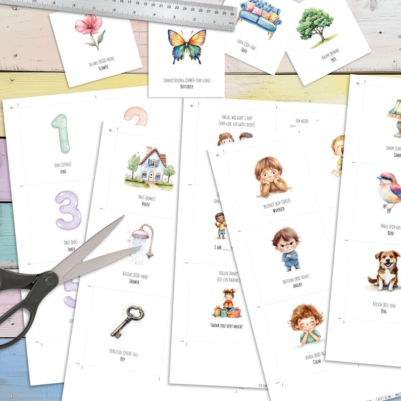 May include: A set of printable flashcards featuring colorful illustrations and words. The cards include images of a butterfly, a flower, a tree, a house, a shower, a key, a boy, a girl, a dog, a bird, and numbers 1, 2, and 3. The cards are designed for children learning basic vocabulary and concepts.