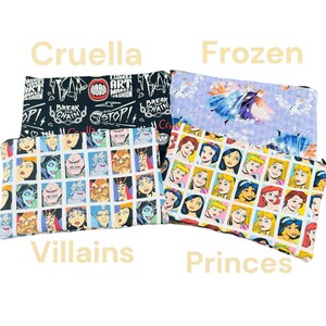 May include: Four different zippered pouches with various Disney character prints. The pouches are made of fabric and have a black zipper. The prints include Cruella de Vil, Frozen, Disney Villains, and Disney Princes.