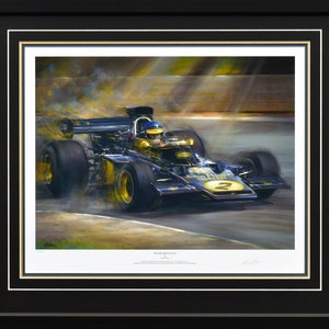 May include: A black and gold Formula One race car with the number 2 on the side, speeding through a track with smoke and light beams behind it. The car is a Lotus 72, driven by John Player Special.