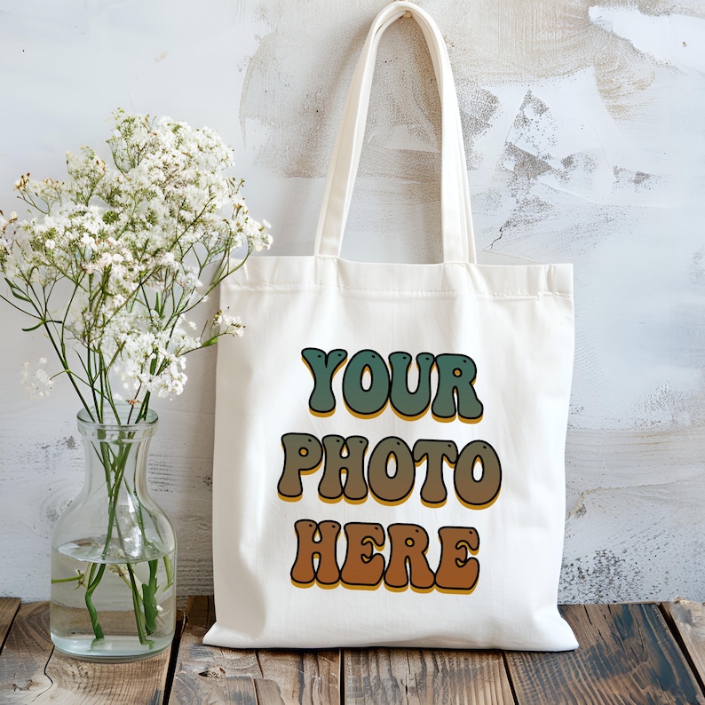 Custom canvas tote bag with your logo printed on durable, eco-friendly 100% cotton canvas in natural color. Perfect for bulk business gifts, branded promotional swag, trade show giveaways, or custom packaging for small shops. Reusable and lightweight with sturdy self-fabric handles, ideal for companies, events, or sustainable marketing campaigns. Great for custom printing, logo branding, or corporate gifting