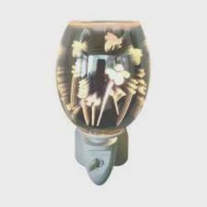 May include: A black glass plug-in nightlight with a floral design and butterflies. The nightlight has a white base and a clear plug.