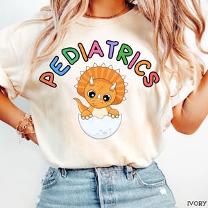 Comfort Colors Pediatrics Nurse Shirt Cute Dinosaur Pediatric Nurse Tshirt PEDS Shirt Nurse Gift Peds Nurse Baby Dino Tee Cute Peds Gift