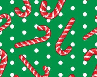 Candy Canes  on bright green  polka dot background -Marshall Dry Goods Sold by the HALF yard