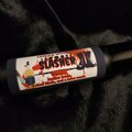 Slasher Perfume - whiskey breath, a latex mask, and a steel blade
