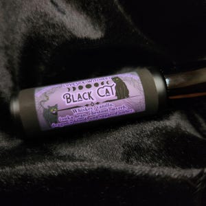 Black Cat Perfume - sugared amber, dragon&#39;s blood, and whiskey