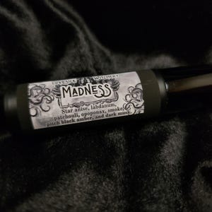 Madness Perfume - labdanum, patchouli, and blackened amber