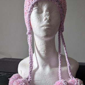 Pink crochet pom pom hat