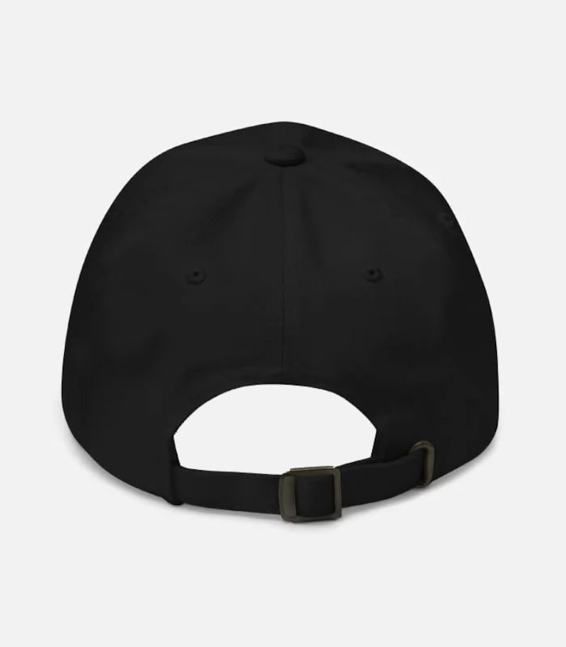 May include: Black baseball cap with an adjustable strap in the back.