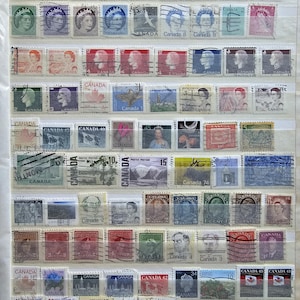 100 Canada stamps + 50 Yugoslavia stamps GIFT
