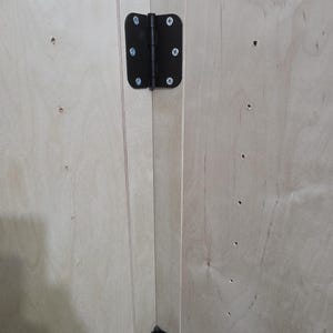 peg holes at different heights to adjust your shelf!