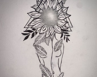 May include: A black and white ink drawing featuring a central sunflower positioned in front of a triangle. The design includes detailed fern leaves and foliage extending downwards from the flower, rendered with fine lines and shading on a plain surface.