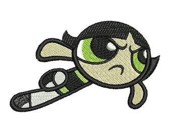 May include: An embroidered patch featuring a cartoon character with short black hair, large green eyes, and a frowning expression. The character is depicted in a dynamic pose with black outlines, wearing a black and green outfit with white accents.