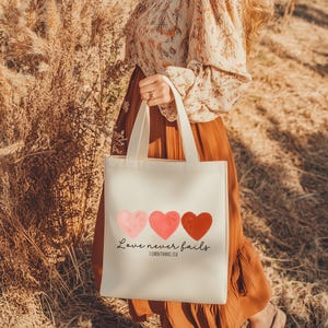 Christian Valentine's Day Tote Bag: Love Never Fails, Cotton Canvas