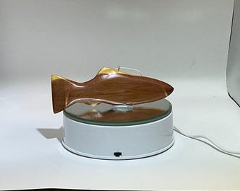 Wooden hand carved fish ornament.