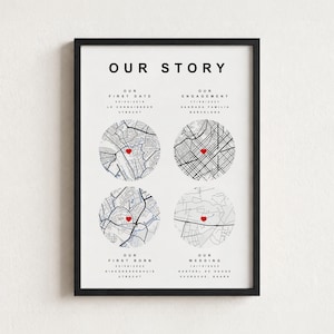 May include: A framed wall art print titled OUR STORY featuring four circular black and white street maps. Each map includes a small red heart icon marking a specific location, with text detailing dates and places for first date, engagement, first born, and wedding.