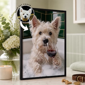 May include: A framed print featuring a white West Highland White Terrier sitting in a bathtub filled with white soap bubbles. The dog is holding a clear glass of red wine with its paw. A circular inset shows the dog's face with the text YOUR PET PHOTO.