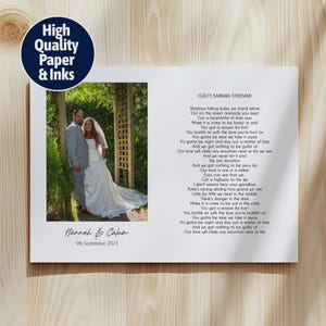 May include: A framed wedding photograph of a couple in formal wear, set in a garden. The print includes song lyrics and the names "Hannah & Calum" with the date "9th September 2023". A circular logo reads "High Quality Paper & Inks".