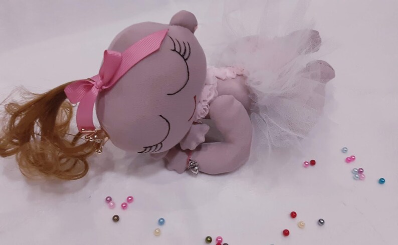 Decorative textile doll