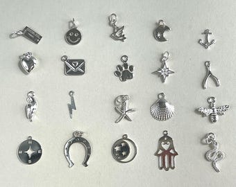 Colgantes de plata de ley: Herradura, Paloma, Abeja, Luna