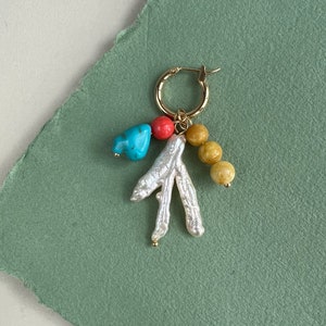 Outstanding charm set include Chiken feet pearl, Coral and turquoise  charm, yellow jade stick.