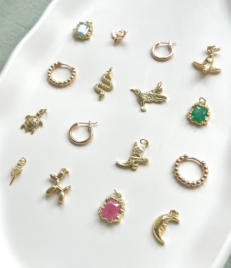 All  charms are coming with 5 mm connection ring. Please let me know if you need smaller/bigger ring.