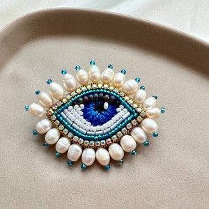 Handmade Evil Eye Brooch: Beaded Amulet Pin with Pearls