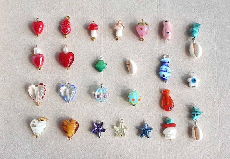 All  charms are coming with 5 mm connection ring. Please letme know if you need smaller/bigger ring.
