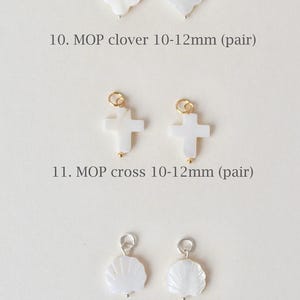 Clover charm
Cross charm