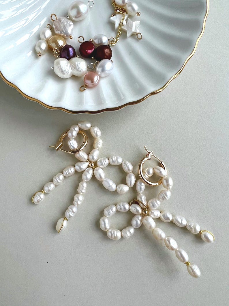 Handmade pearls bow.