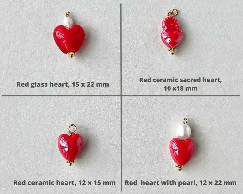 May include: Four red heart charms with gold accents. The charms are made of glass and ceramic. The charms are different sizes and shapes. The charms are perfect for jewelry making.