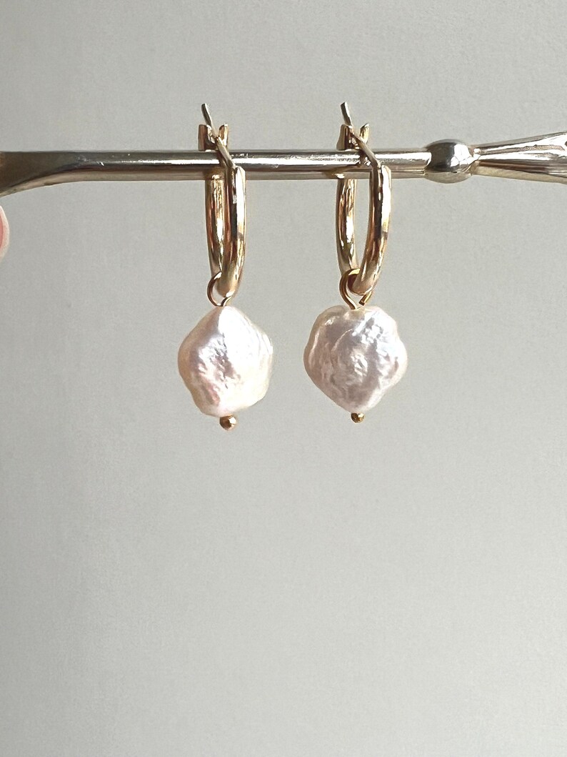 Flower  shaped pearls. Gold plated and gold filled hoops are sold separately.