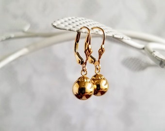 10K Gold Dangling Ball Earrings- 10 K Gold - Lever Back - Ball has a small dent but Isn't too Visible On Ear -Amazing Earrings!