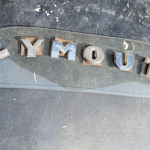 1949 Plymouth Hood Letters