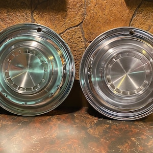 Vintage Chrysler Hubcaps set of 2