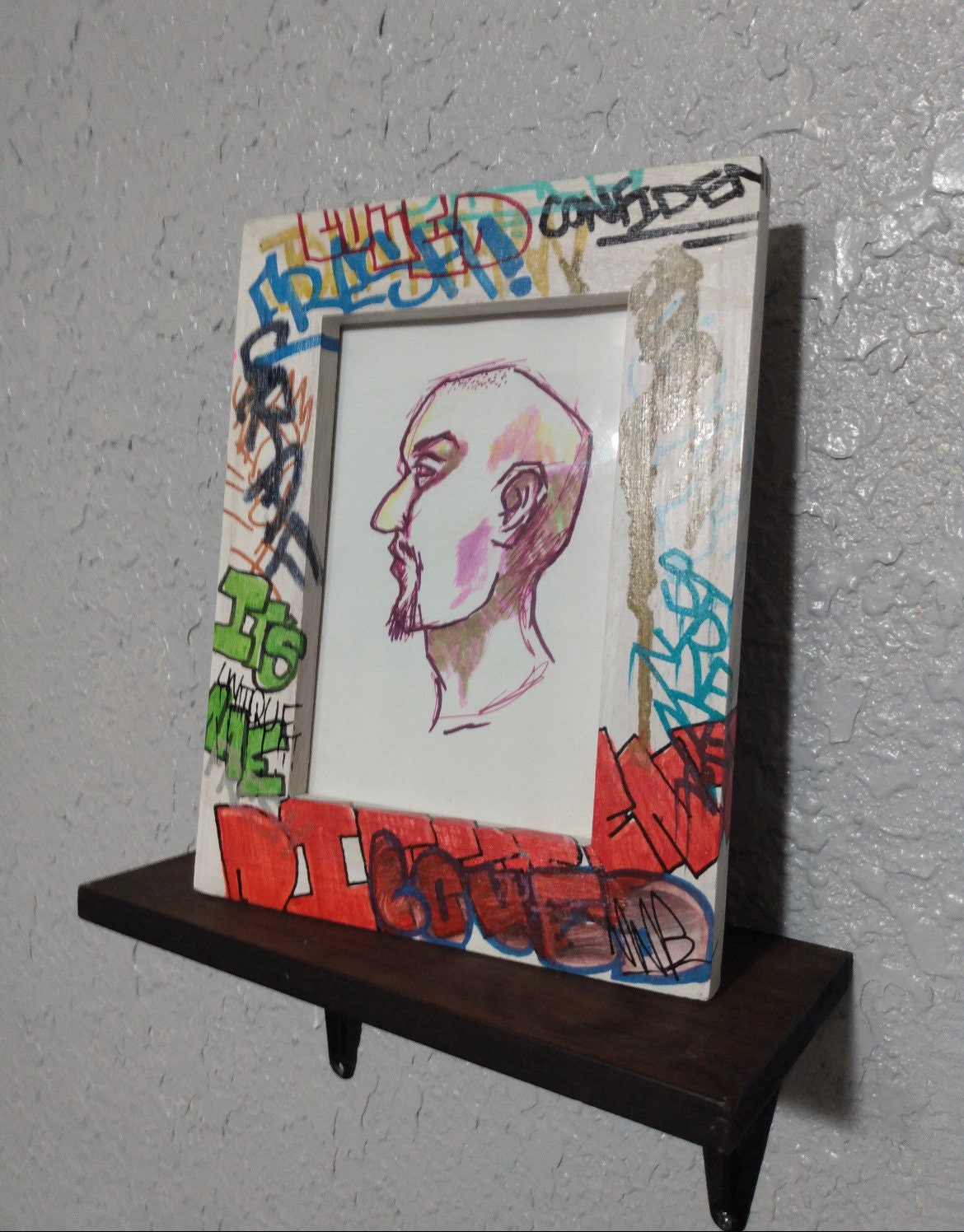 Frame with graffiti spray paint