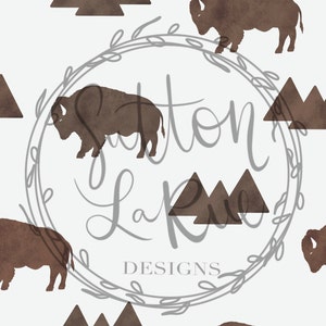 May include: A seamless pattern featuring brown silhouettes of bison and mountain ranges on a white background. The pattern is perfect for fabric, wallpaper, or other design projects.